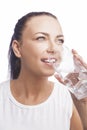 Woman Drinking Water. Isolated On White Background Royalty Free Stock Photo