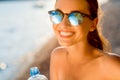 Woman drinking water from transparent bottle on Royalty Free Stock Photo