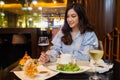 Woman drinking wine in the restaurant Royalty Free Stock Photo