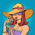 a woman drinks a cocktail on the beach, summer vacation. Soft drink Royalty Free Stock Photo