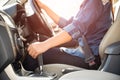 Woman driver hand shifting or changing the gear stick