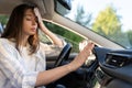 Girl driver has problem with non-working conditioner hand checking flow cold air suffering from heat