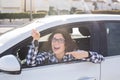 Woman Driver Holding Car Keys siting in Her New Car Royalty Free Stock Photo