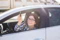 Woman Driver Holding Car Keys siting in Her New Car Royalty Free Stock Photo