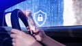 Woman driver holding smartphone with shield protection icon in car, Security shield Lock Security, Protect Concept display, secure Royalty Free Stock Photo