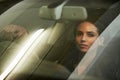 Woman, driver and look through windshield, portrait and car for transportation and night commute. Female, travel and Royalty Free Stock Photo