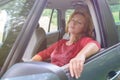 Woman is resting in the car Royalty Free Stock Photo