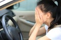 Woman driver sad in car