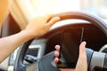 Woman driver use cell phone driving car Royalty Free Stock Photo