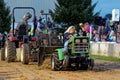 A Woman Drives at a Lawn Tractor Pull