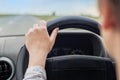 Woman driving car, hand on steering wheel Royalty Free Stock Photo