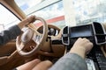 Woman driving car with her hand on gear shift lever Royalty Free Stock Photo