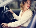 Woman driving a car in reverse Royalty Free Stock Photo
