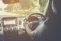 Woman driving car, steering wheel of a car Royalty Free Stock Photo