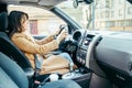 Woman driving car view from inside