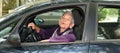 A woman driving her car Royalty Free Stock Photo