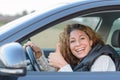 Woman is driving her car Royalty Free Stock Photo