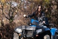 Woman Driving Off-road With Quad Bike or Atv Royalty Free Stock Photo