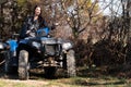 Woman Driving Off-road With Quad Bike or Atv Royalty Free Stock Photo