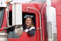 Woman driving a semi-truck