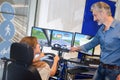 woman in driving simulator Royalty Free Stock Photo