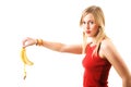 Woman droping banana skin