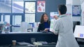 Woman in drugstore at checkout