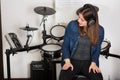 Woman drummer practicing at home Royalty Free Stock Photo