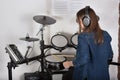 Woman drummer practicing at home Royalty Free Stock Photo