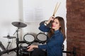 Woman drummer practicing at home Royalty Free Stock Photo