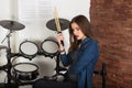 Woman drummer practicing at home Royalty Free Stock Photo