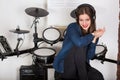 Woman drummer practicing at home Royalty Free Stock Photo
