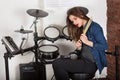 Woman drummer practicing at home Royalty Free Stock Photo