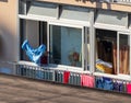 Woman drying clothes in italy quarantine
