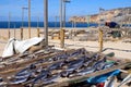 Woman drying fish in Nazare, Portugal
