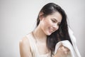 A woman is drying her hair with a towel after showering Royalty Free Stock Photo