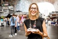 Woman with dutch herring Royalty Free Stock Photo