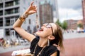 Woman with dutch herring Royalty Free Stock Photo