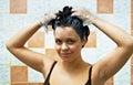 Woman dyeing hairs Royalty Free Stock Photo