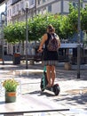 Woman on an e-kickscooter in Wiesbaden, Germany