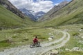 Woman on e mountain bike in the mountains of Zermatt Royalty Free Stock Photo