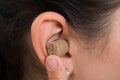 Woman Ear With Hearing Aid Royalty Free Stock Photo