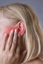 Woman with earache, ear pain closeup Royalty Free Stock Photo