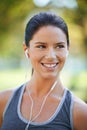 Woman, earphones and music for exercise in park, closeup and audio inspiration for training in marathon race. Young lady Royalty Free Stock Photo