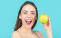 Woman eat green apple. Portrait of young beautiful happy smiling woman with green apples. Healthy diet food. Stomatology Royalty Free Stock Photo