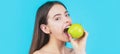 Woman eat green apple. Portrait of young beautiful happy smiling woman with green apples. Healthy diet food. Stomatology Royalty Free Stock Photo