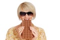 Woman eat large chocolate Royalty Free Stock Photo