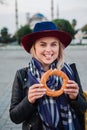 Woman eat testy turkish simit or bagel, Istanbul, Turkey travel