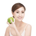 Woman eating apple smiling on white background. Royalty Free Stock Photo