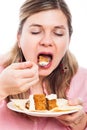 Woman eating cake Royalty Free Stock Photo